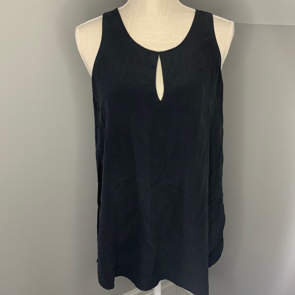 Woman top, black color, light used.